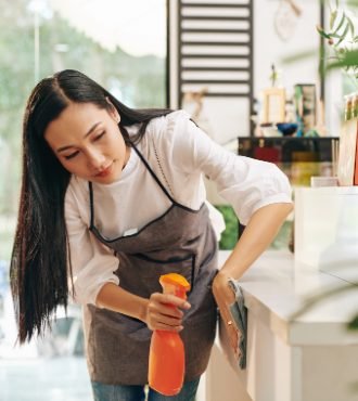 Pretty young Vietnamese coffeeshop owner cleaning every nook in cafe with disinfecting detergent when getting ready for opening after quarantine SSUCv3H4sIAAAAAAAACoRUuY7bMBDtA+QfBNUhQFESKe4HpAy2SBek4GkTS4mGSCVYLPzvGV1rynGyjaF5M/PmcQ6/ff5UFKUU0anyqXibLbCd91NMo0guDADjLxs+mkGbMUeMdimMTvgclCKp8yB6A+AweT/D18VZxiTSFE3MisXzlJIZYwrqBeA6i1YimRPQH+J3sT9Wu9gdixMywFU+m3DxptwErWUmOXu+GzPEcsfXOv8g+QZSx4ckz14MKRZi0EUajcn41o+feyfEyQzq9SZ+hrzoX3P5gNVWqkZajGrJCGoEs6jjiiJTk0pLZpix+KCjYo0SVDWIUNugRhoyJ9SI1Bwryzm3NXkXtauZe+dOS58v55DCnYivIehDka2JD2j0aEQfk1smnHNUlBx1Ena0KX7Ed7cCOeMhnd6S149rtiyj8Uasq7URlEwSa5hiqKk7+KG0RV2jJbJU1Z1oOk2ZXShXLeXLb1DRL8u2kYpJu5At36+ghI93a3oZnXLDKUsL6bzcyZ6mwjSkcR77+4NKH8JFSGjwU2GB0+z4WcQI4XrH83uAqwx9VmcIaXnwxlpqOJjZrGrYhApj2nWctbiu6Baw3t/ZAc8iZxc4XXwQ2sxFb6t6N5aq5Q2tOlrhrfm7YriK3kHkx9mENh3/e3RLjNP/+VeAjYd3YNifdhnYlujmkiXhtG2o4Iiw+XwsrpC0vENYd5ppQlsiOWRd/wAAAP//AwDiczso7QQAAA==